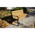 recycled plastic outdoor park and memorial bench standing quietly in a beautiful fall afternoon. This bench is a great option for gardens too