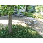 picnic tables 2 outdoor patio tables for dining are installed by a community center in the backyard